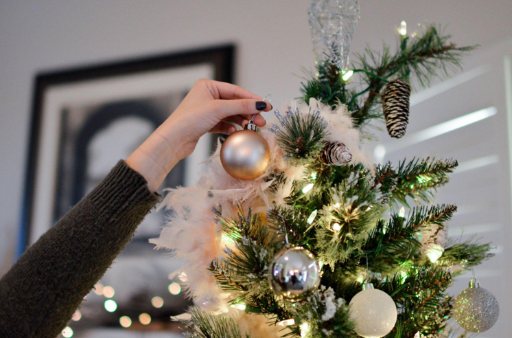 Adding a Touch of Garden Charm to Your Holiday Decor with a Slim Artificial Christmas Tree